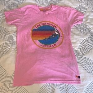 An aviator nation tee. Worn very few times. Still in good condition. Size 14